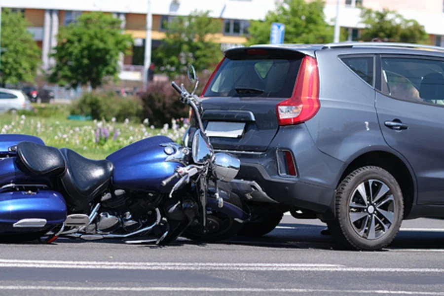 Motorcycle crash on a car