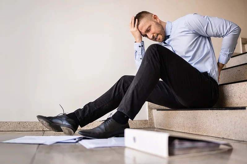 Man slipped from stairs in the office and sustained a slip and fall injury