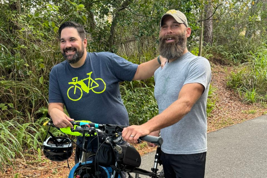 Veterans Percy Canteenwalla and Daniel Friedline on their Florida coast-to-coast bike ride - WHG