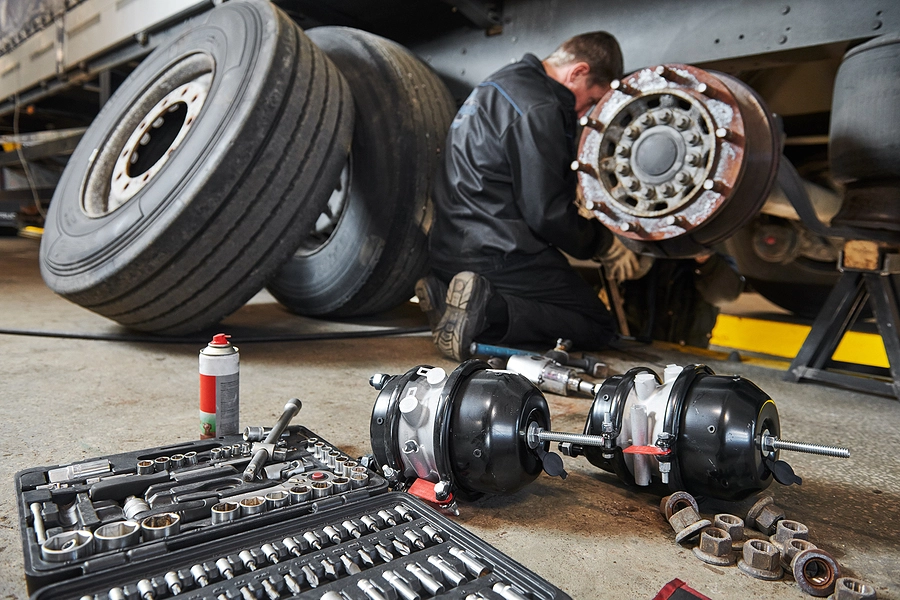 a mechanic fixing a semi truck who could have third-party liability in a truck accident case