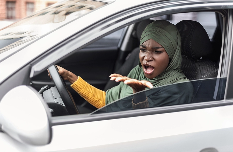 motorist yelling at a pedestrian who is at fault for causing an accident