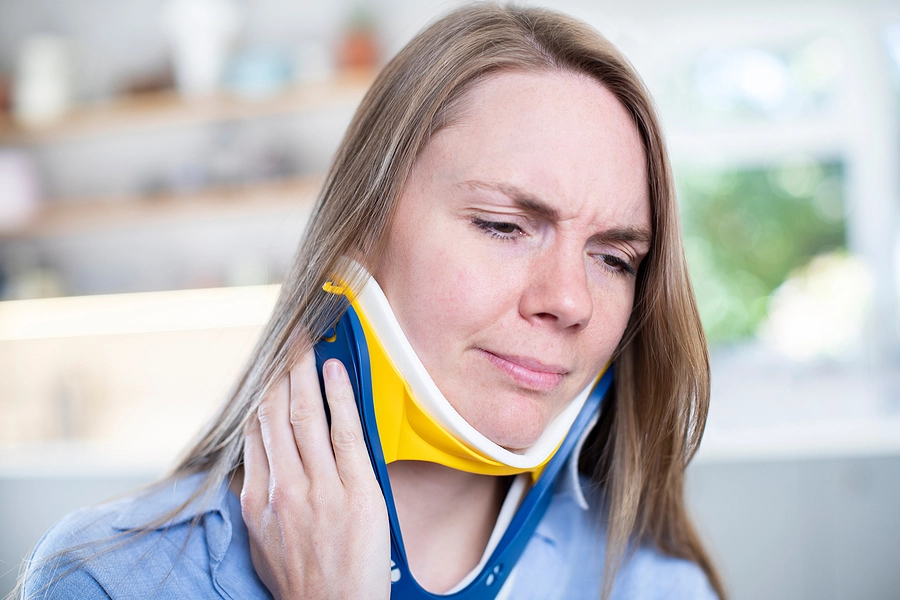 woman with neck brace due to an injury in a west miami personal injury accident