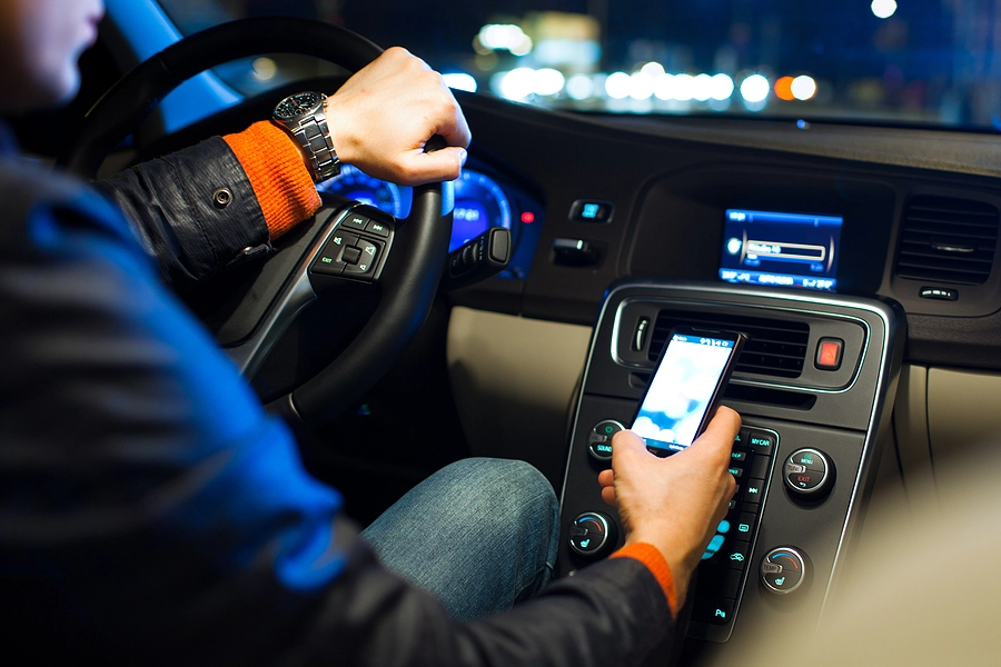 coral gables driver texting while driving about to cause an accident at night