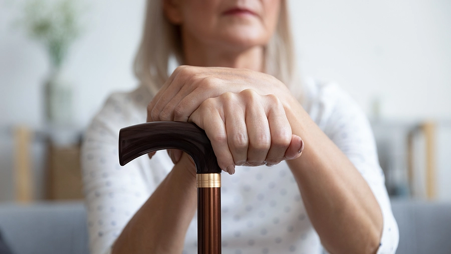 Florida woman with a disability and cane eligible for SSI SSDI benefits