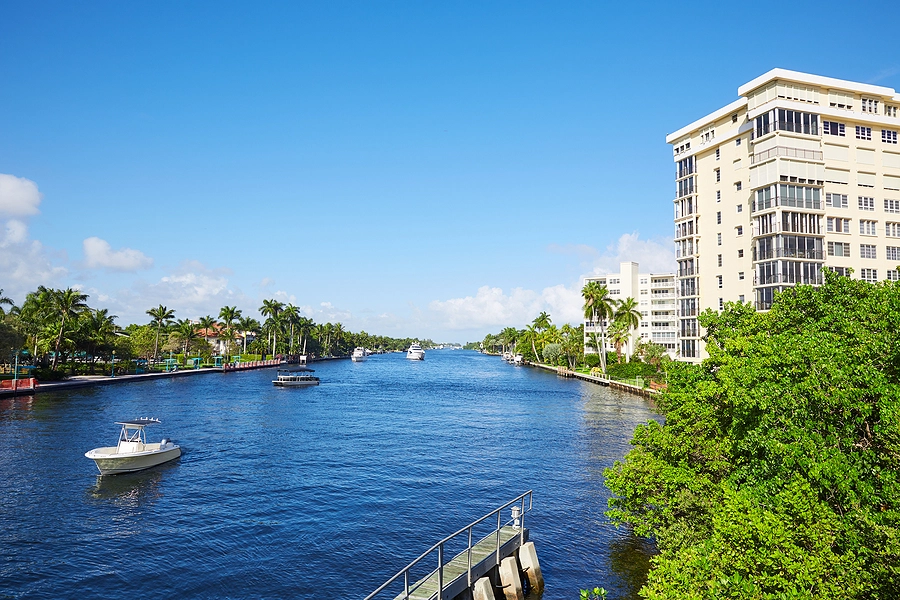 local waterway with a hotel and car nearby in delray beach