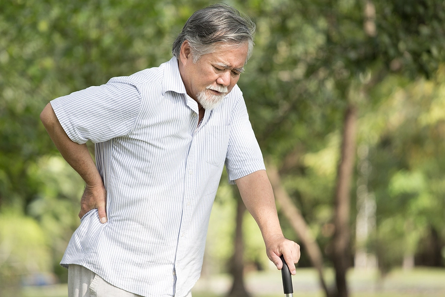 older asian veteran with a cane an an injury that makes him entitled to additional VA benefits